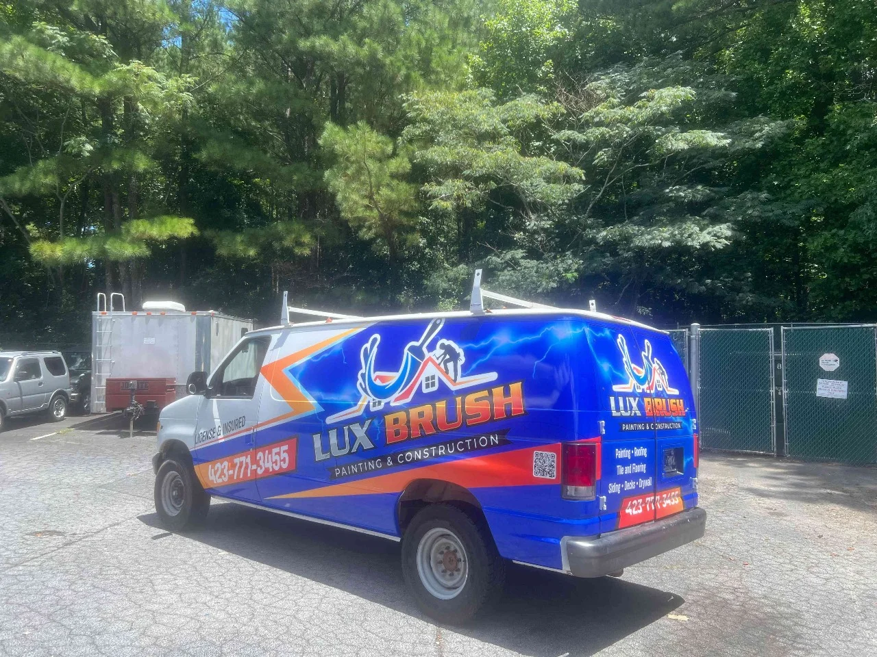 Blue Lux Brush work van with vivid full commercial wrap