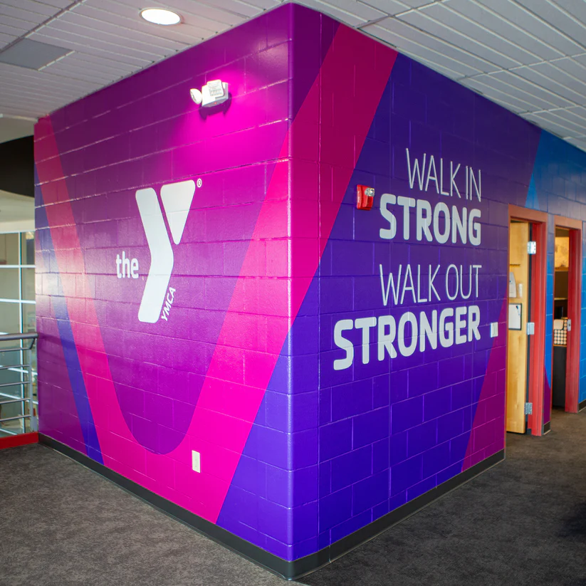 Purple and pink YMCA motivational wall graphic